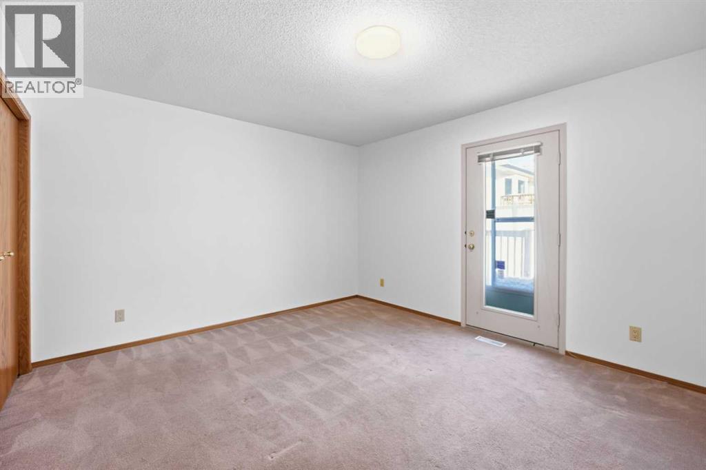 12 Arbour Cliff Close NW, Calgary, Alberta  T3G 3W8 - Photo 18 - A2276284