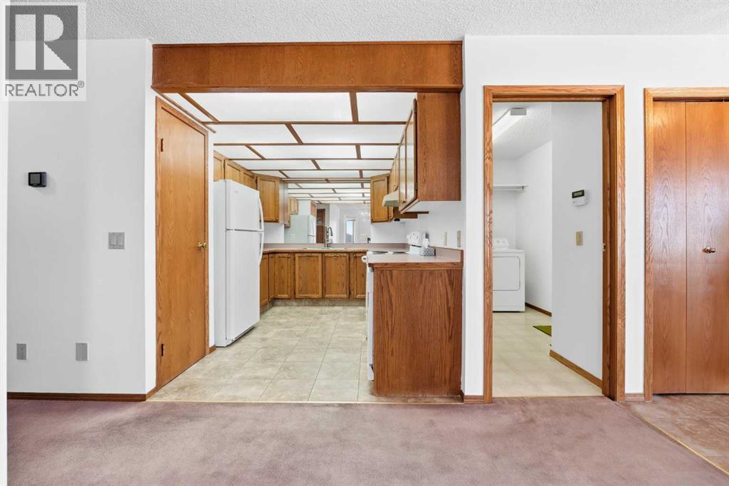 12 Arbour Cliff Close NW, Calgary, Alberta  T3G 3W8 - Photo 8 - A2276284