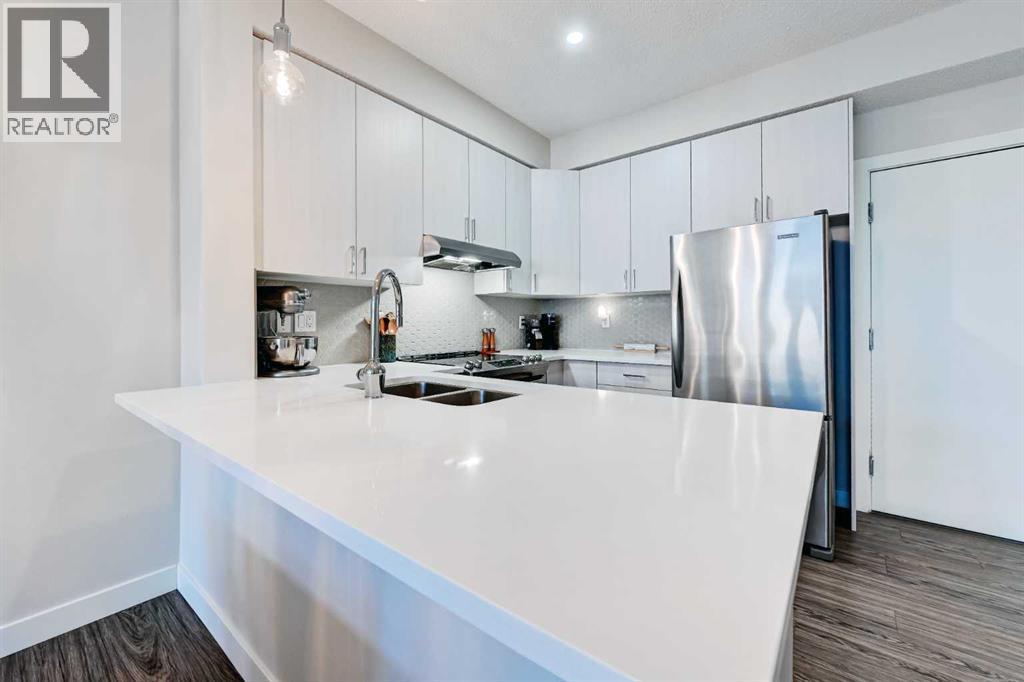 305, 1000 15 Avenue SW, Calgary, Alberta  T2R 0S6 - Photo 7 - A2303592