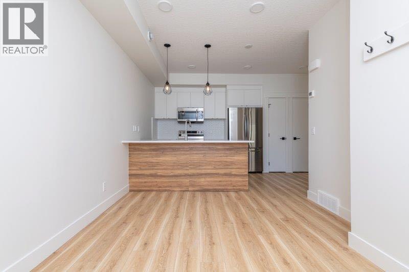 706, 10060 46 Street NE, Calgary, Alberta  T3J 2H8 - Photo 1 - A2268486