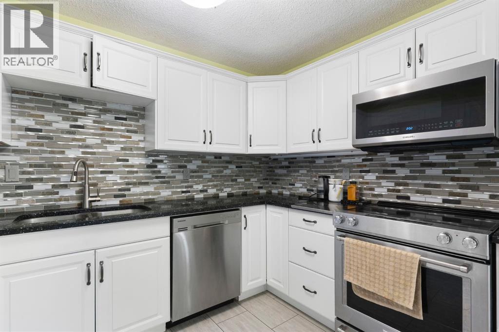 8 Hawkfield Crescent NW, Calgary, Alberta  T3G 1Z5 - Photo 9 - A2304656