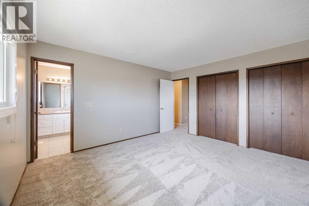 128 Silver Ridge Rise NW, Calgary, Alberta  T3B 4P7 - Photo 13 - A2305052