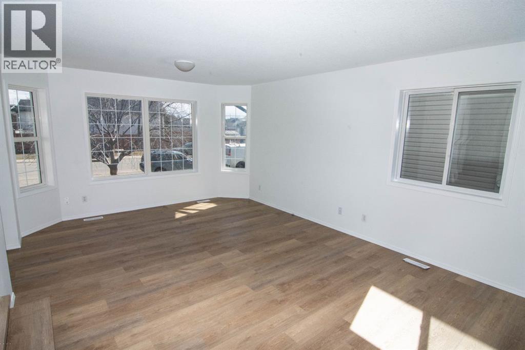 5320 Martin Crossing Drive Ne, Calgary, Alberta  T3J 3T2 - Photo 3 - A2306775