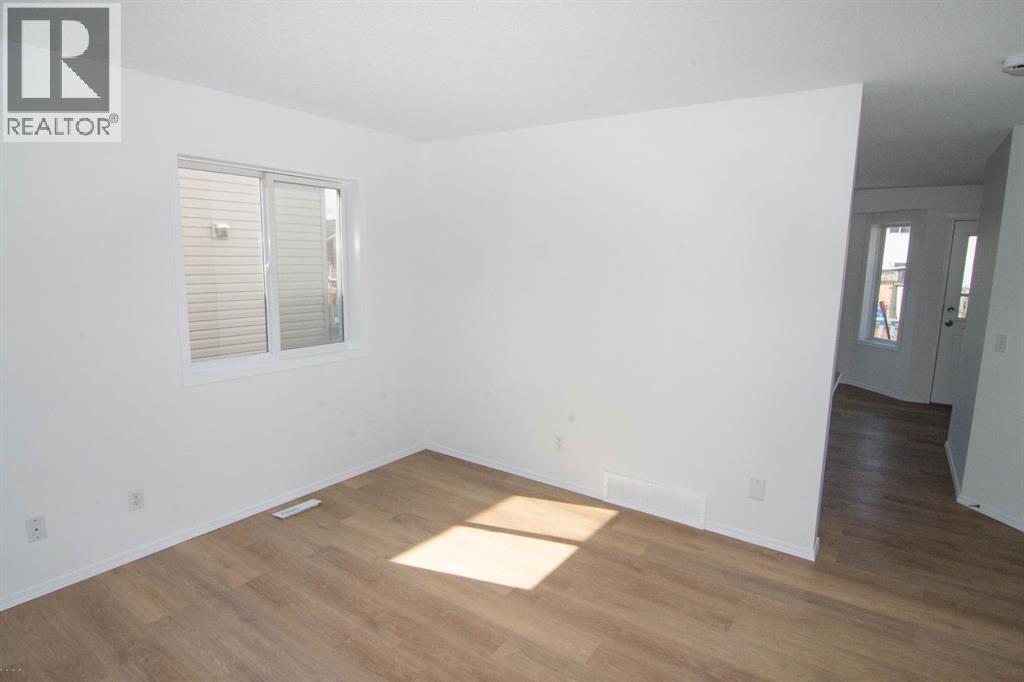 5320 Martin Crossing Drive Ne, Calgary, Alberta  T3J 3T2 - Photo 5 - A2306775