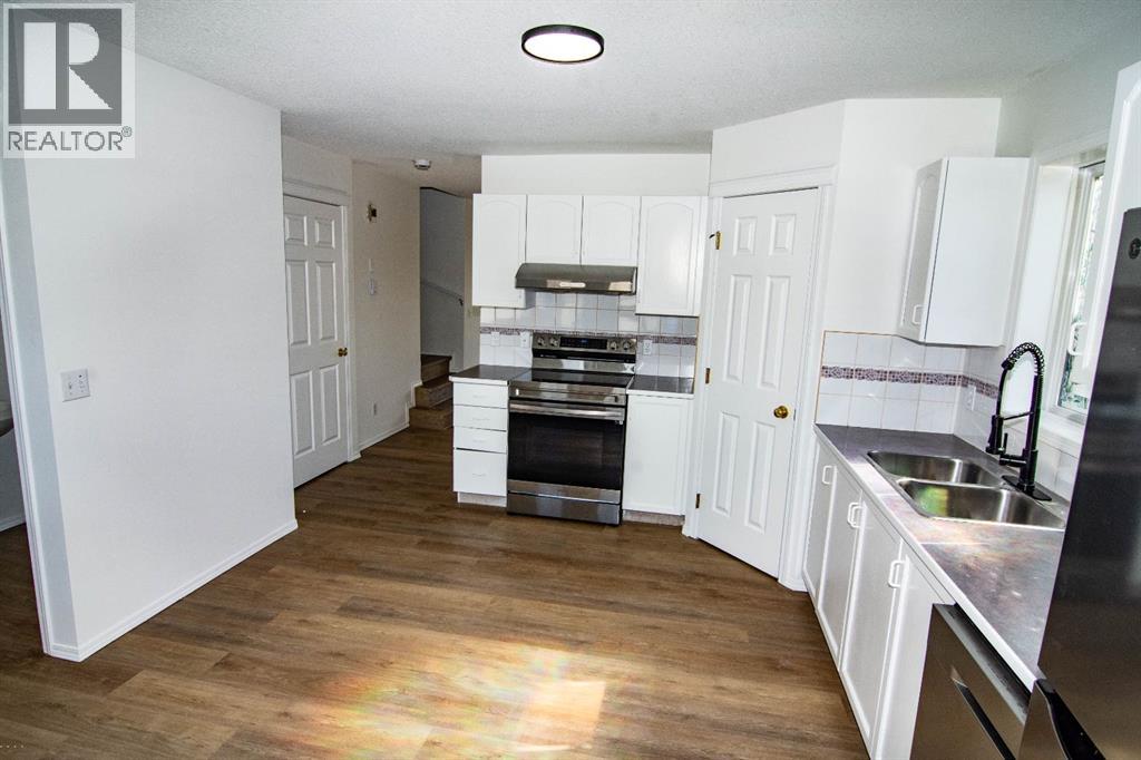 5320 Martin Crossing Drive Ne, Calgary, Alberta  T3J 3T2 - Photo 8 - A2306775