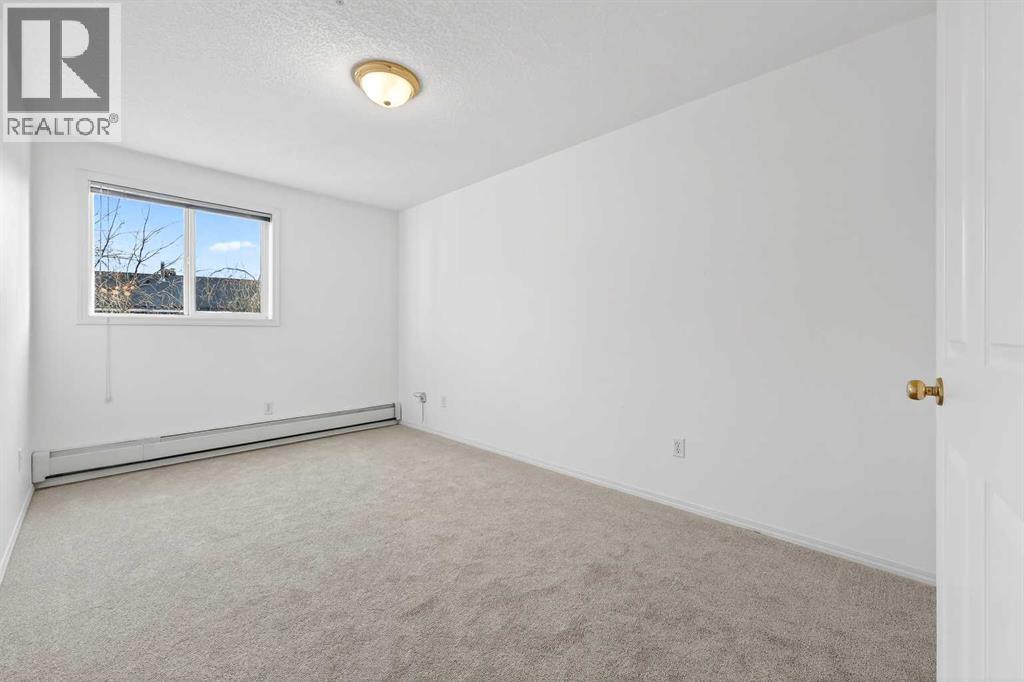 210, 165 Manora Place NE, Calgary, Alberta  T2A 7X5 - Photo 23 - A2278132