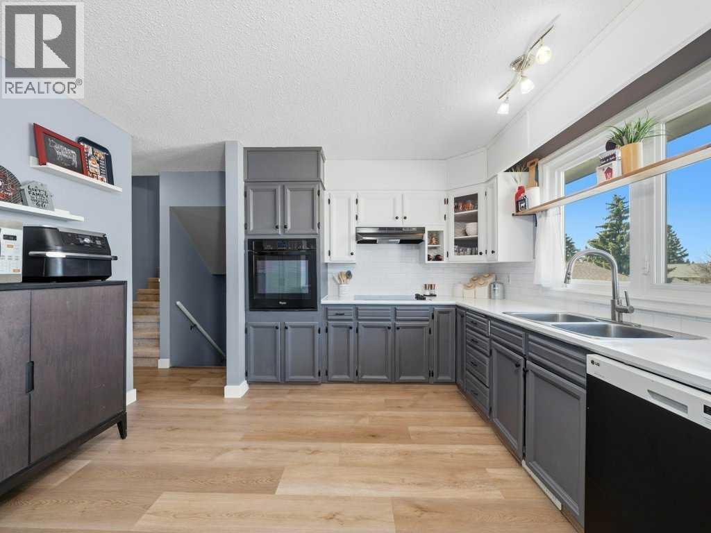 235 Rundleridge Drive NE, Calgary, Alberta  T1Y 2K5 - Photo 8 - A2306899