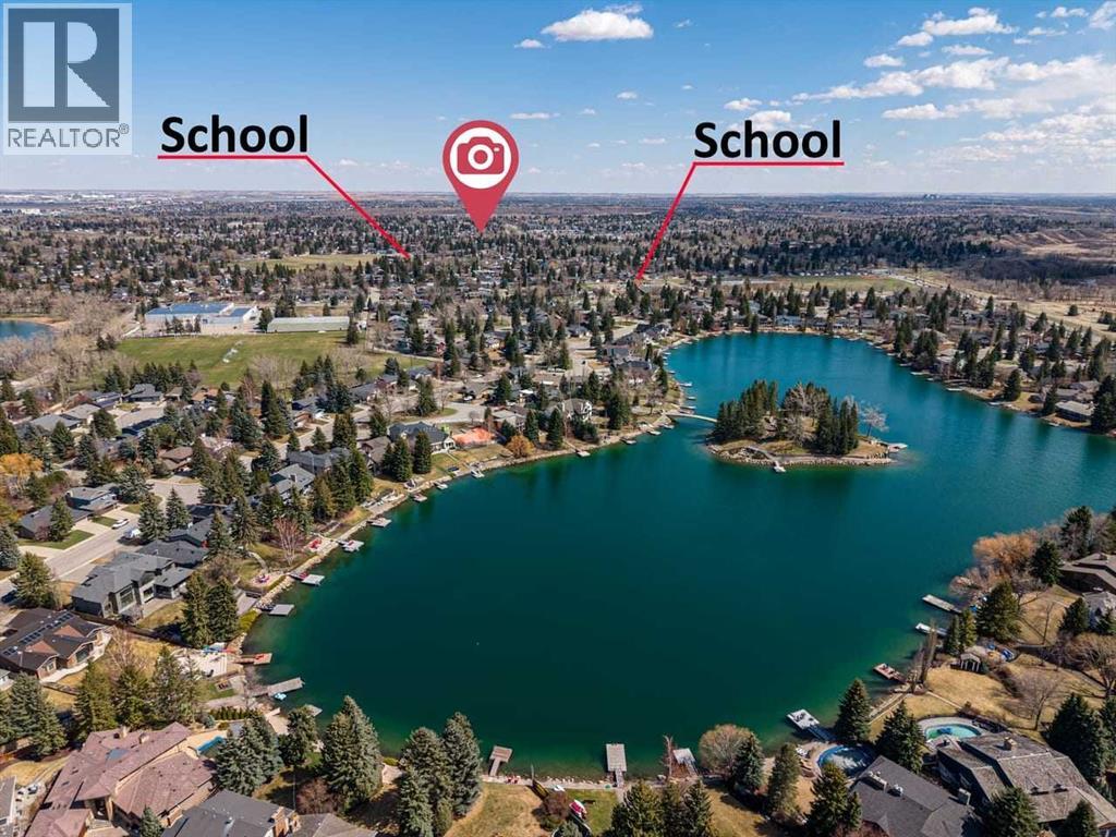 36 Lake Twintree Place SE, Calgary, Alberta  T2J 2X5 - Photo 44 - A2301243