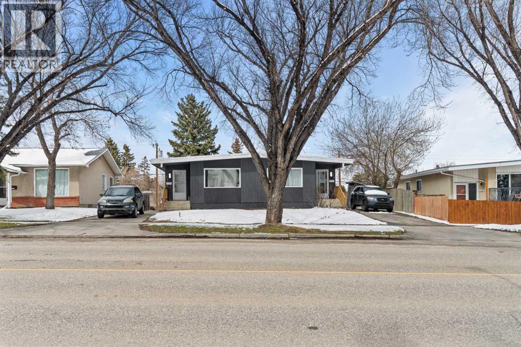 710 / 712 72 Avenue NW, Calgary, Alberta  T2K 0P4 - Photo 1 - A2305351