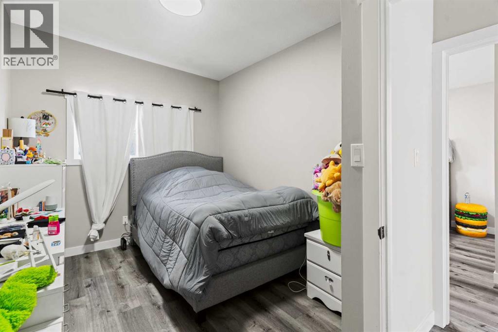 710 / 712 72 Avenue NW, Calgary, Alberta  T2K 0P4 - Photo 12 - A2305351