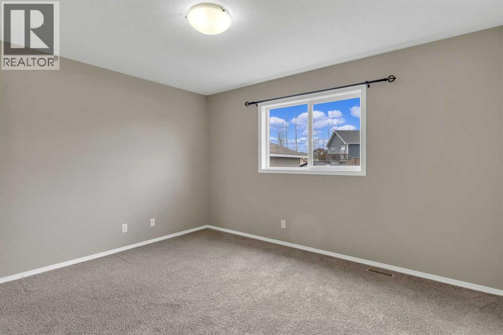 66 Heritage Drive, Penhold, Alberta  T0M 1R0 - Photo 20 - A2306022