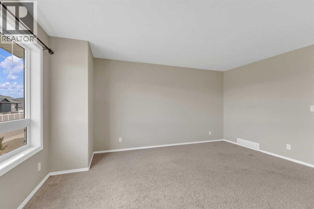 66 Heritage Drive, Penhold, Alberta  T0M 1R0 - Photo 5 - A2306022