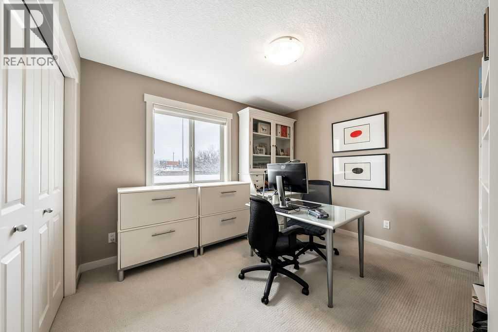 78 Ypres Green SW, Calgary, Alberta  T2T 6M1 - Photo 24 - A2288359