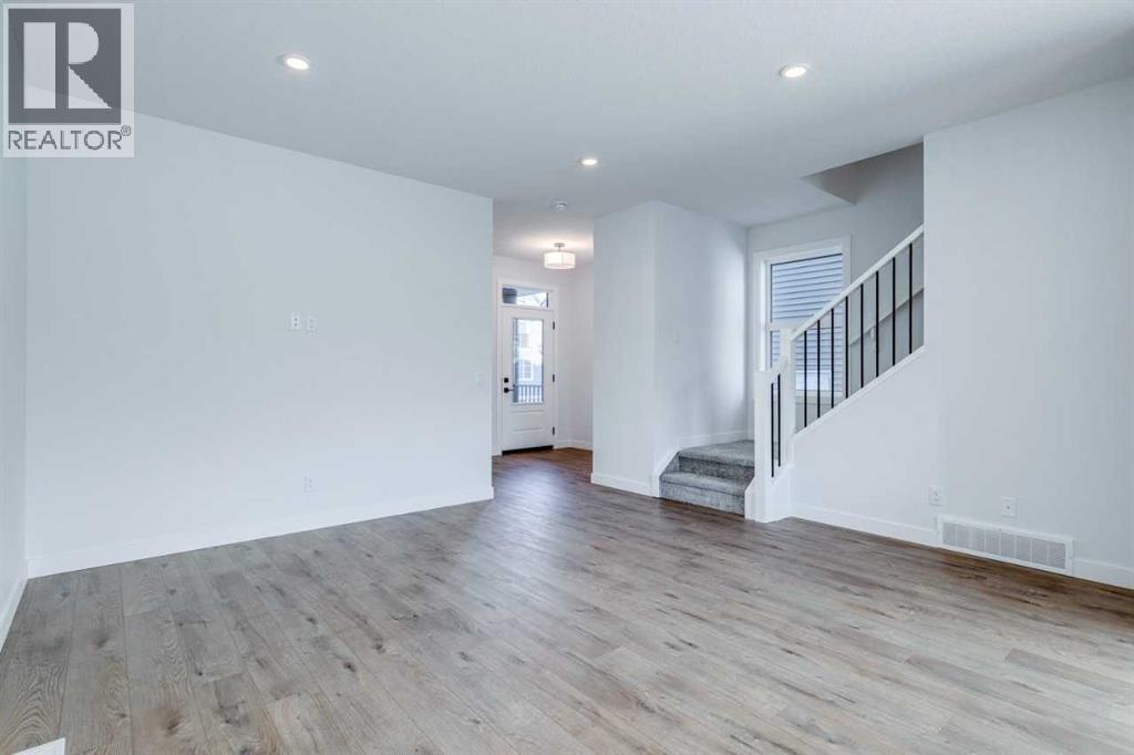 77 Savanna Place NE, Calgary, Alberta  T3J 4B6 - Photo 5 - A2286957