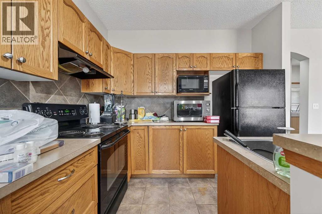 744 Luxstone Landing SW, Airdrie, Alberta  T4B 3L1 - Photo 11 - A2294923