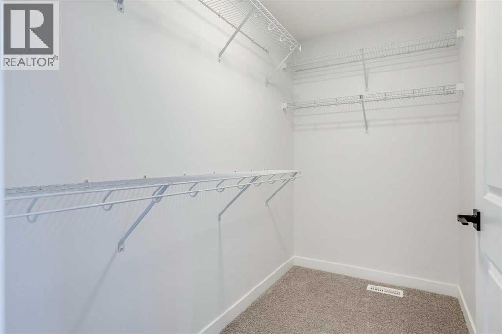 77 Savanna Place NE, Calgary, Alberta  T3J 4B6 - Photo 31 - A2286957