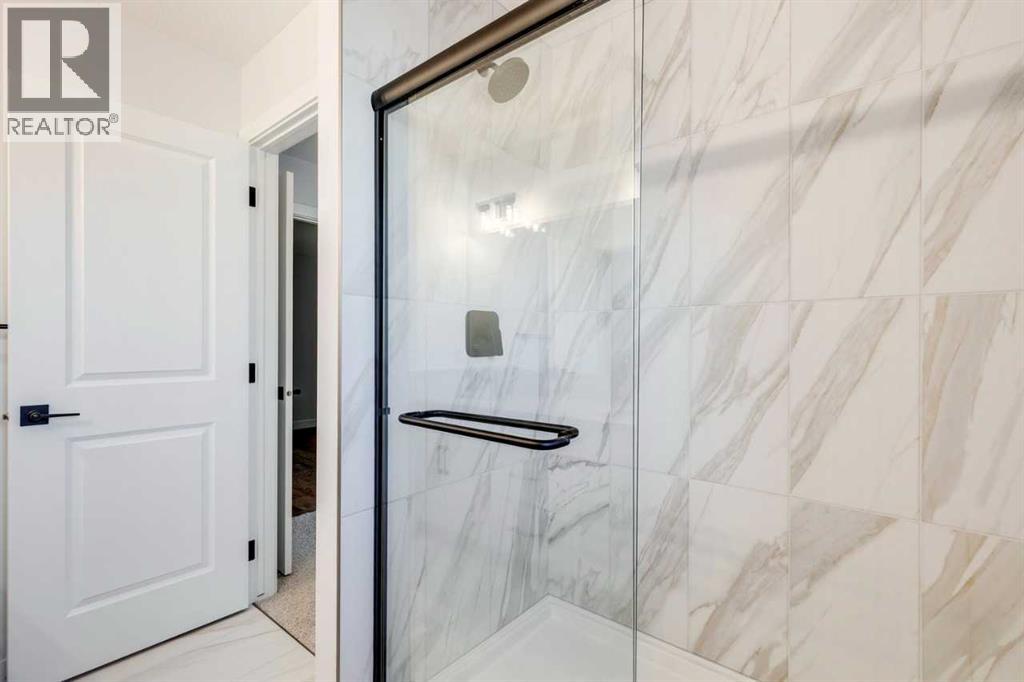 77 Savanna Place NE, Calgary, Alberta  T3J 4B6 - Photo 30 - A2286957