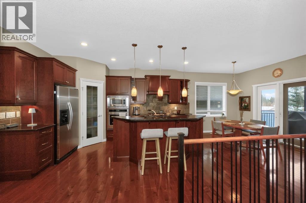 2735 Evercreek Bluffs Way SW, Calgary, Alberta  T2Y 4P6 - Photo 8 - A2306323