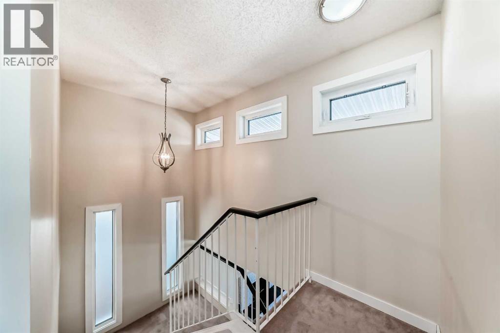 119 Woodglen Grove SW, Calgary, Alberta  T2W 4J9 - Photo 18 - A2304961