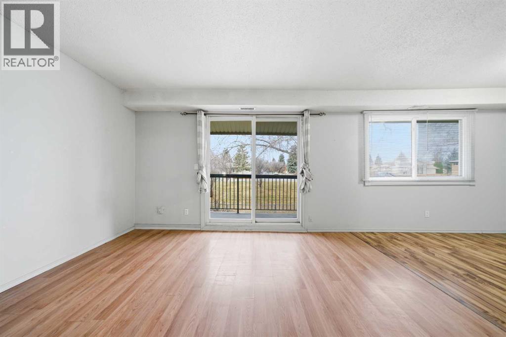 306, 2200 Woodview Drive Sw, Calgary, Alberta  T2W 3N6 - Photo 4 - A2306365