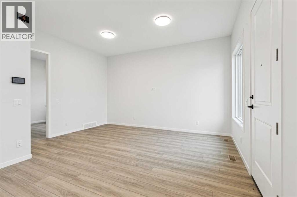 572 Belmont Heath SW, Calgary, Alberta  T0L 0X0 - Photo 40 - A2284249