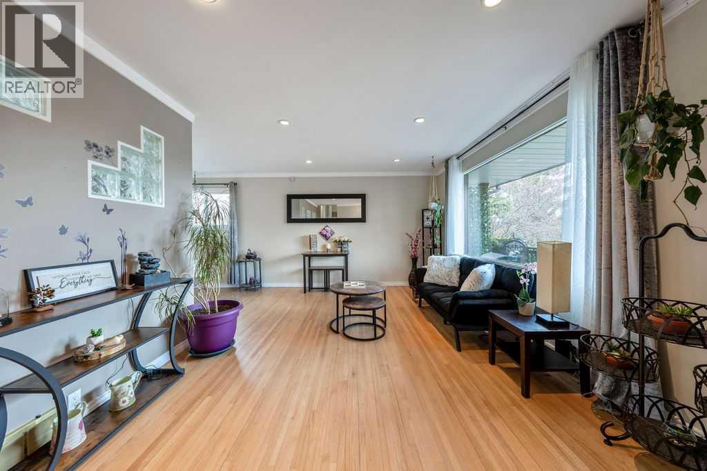 1441 Hunterbrook Road NW, Calgary, Alberta  T2K 4V3 - Photo 5 - A2306612