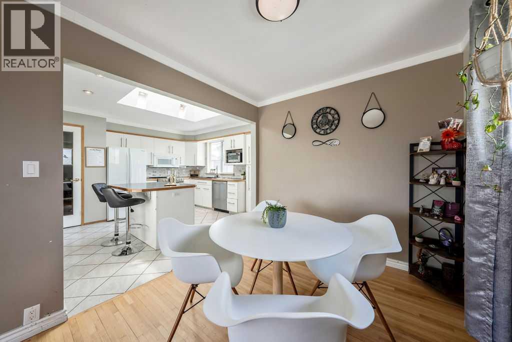 1441 Hunterbrook Road NW, Calgary, Alberta  T2K 4V3 - Photo 10 - A2306612