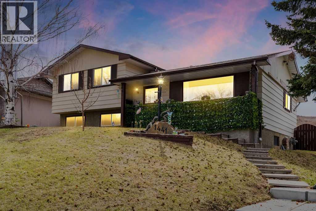 1441 Hunterbrook Road NW, Calgary, Alberta  T2K 4V3 - Photo 1 - A2306612
