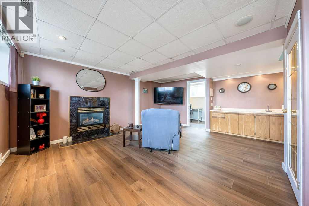 1441 Hunterbrook Road NW, Calgary, Alberta  T2K 4V3 - Photo 24 - A2306612