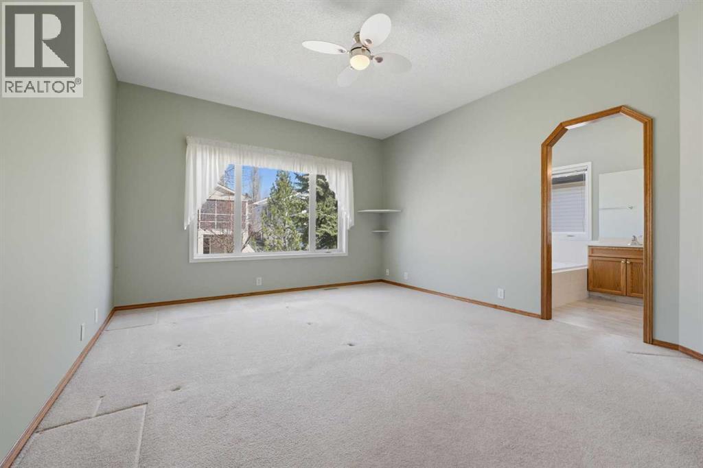 37 Rocky Ridge Gardens Nw, Calgary, Alberta  T3G 4V7 - Photo 19 - A2306110