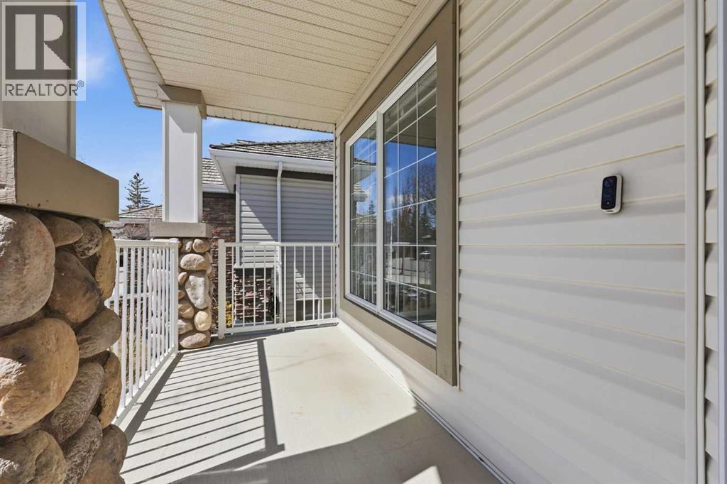 37 Rocky Ridge Gardens Nw, Calgary, Alberta  T3G 4V7 - Photo 9 - A2306110