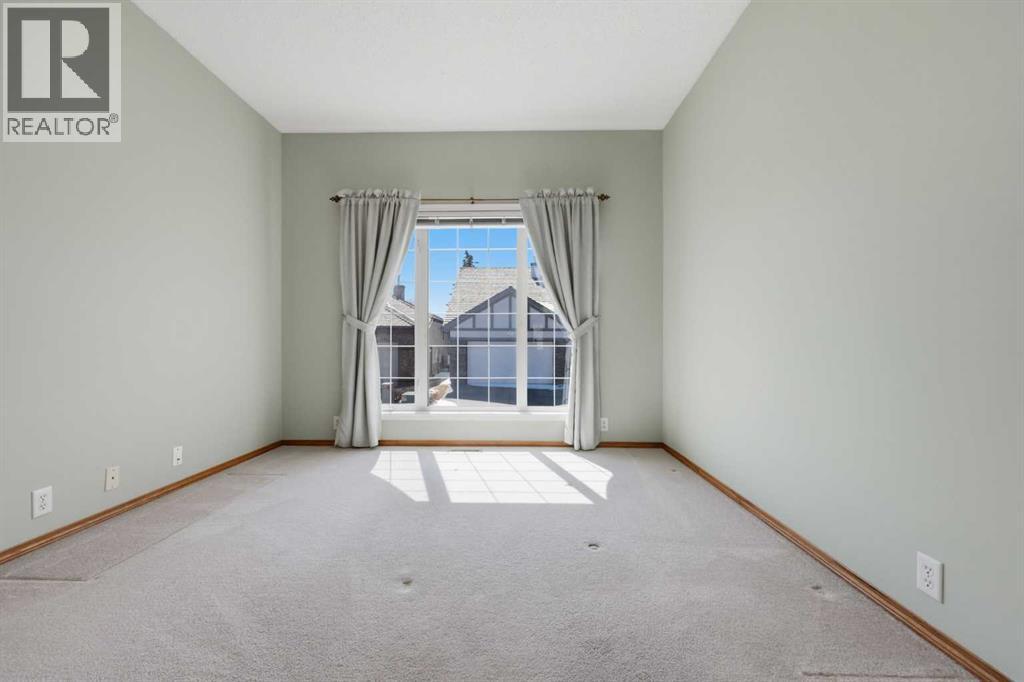 37 Rocky Ridge Gardens Nw, Calgary, Alberta  T3G 4V7 - Photo 25 - A2306110