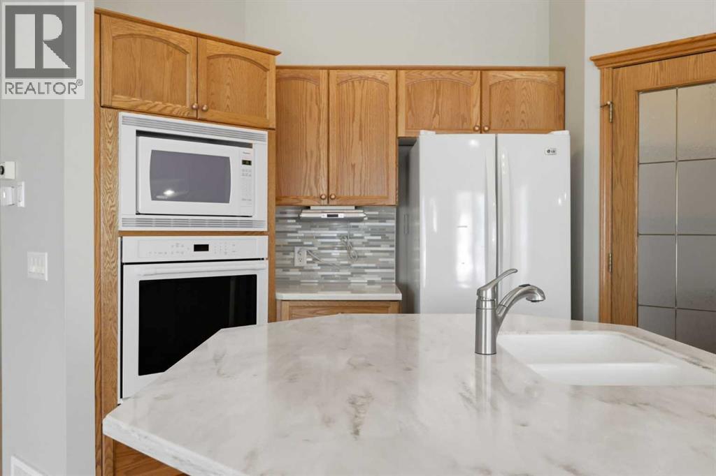 37 Rocky Ridge Gardens Nw, Calgary, Alberta  T3G 4V7 - Photo 17 - A2306110