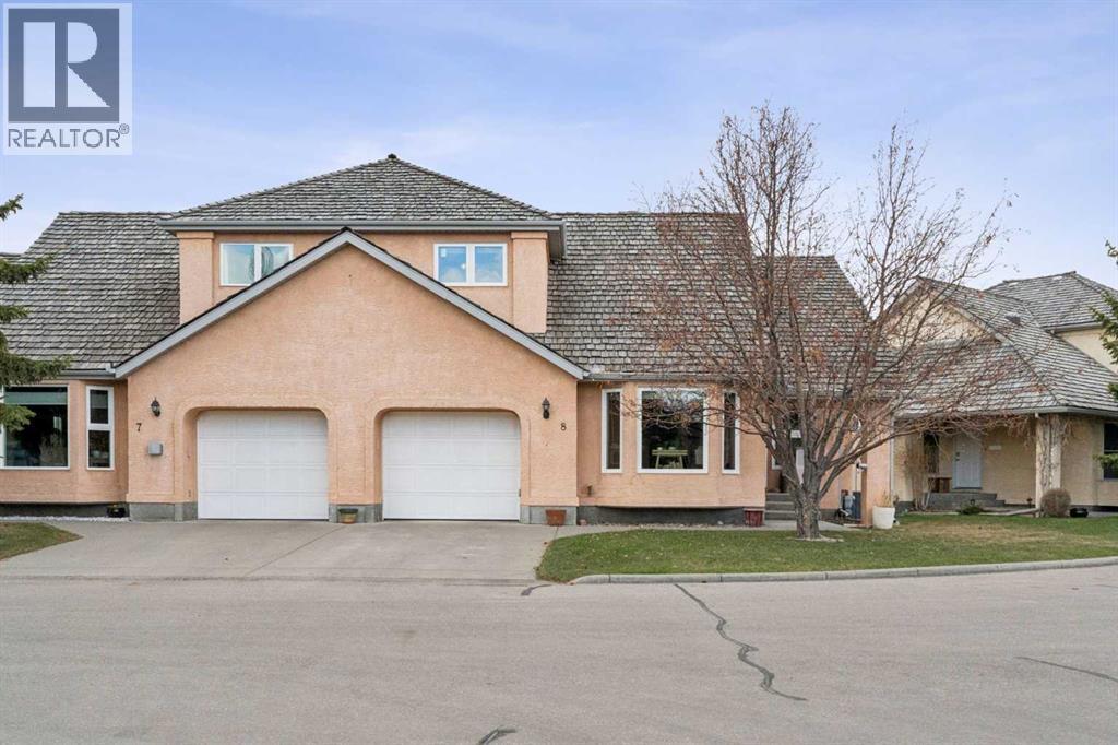8, 26 Quigley Drive, Cochrane, Alberta  T4C 1M2 - Photo 2 - A2305379