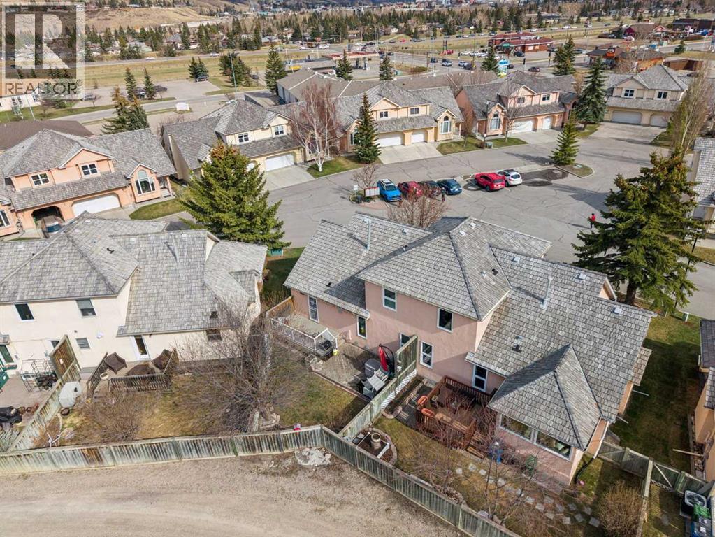 8, 26 Quigley Drive, Cochrane, Alberta  T4C 1M2 - Photo 39 - A2305379