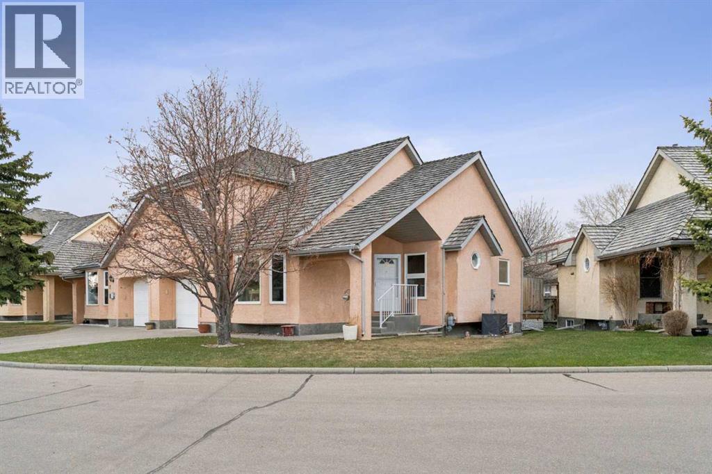 8, 26 Quigley Drive, Cochrane, Alberta