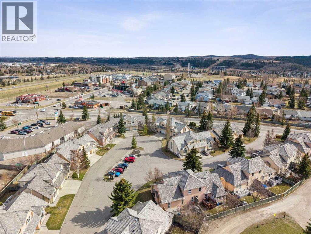 8, 26 Quigley Drive, Cochrane, Alberta  T4C 1M2 - Photo 40 - A2305379