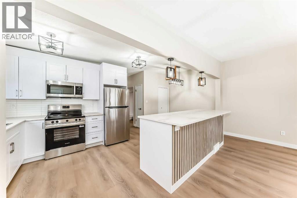 7406-7408 Hunterfield Road NW, Calgary, Alberta  T2K 4L1 - Photo 4 - A2276447