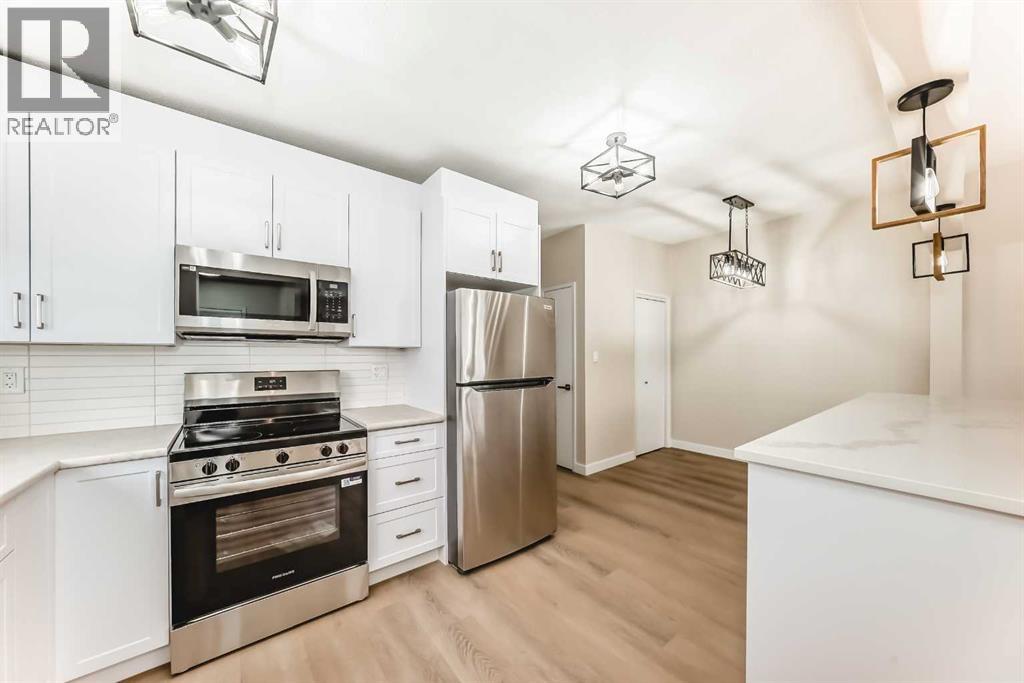 7406-7408 Hunterfield Road NW, Calgary, Alberta  T2K 4L1 - Photo 6 - A2276447