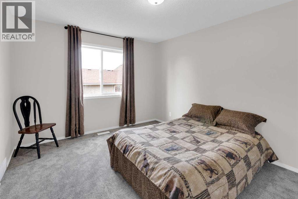155 Tuscany Springs Gardens Nw, Calgary, Alberta  T3L 2R5 - Photo 12 - A2306897