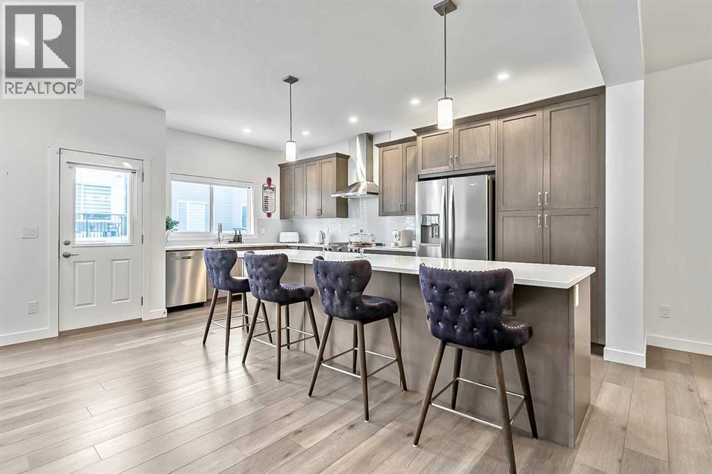 882 Bluerock Way SW, Calgary, Alberta  T2Y 0S5 - Photo 8 - A2293006