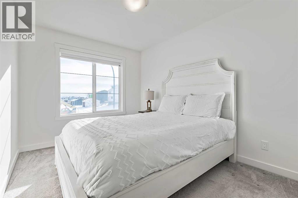 882 Bluerock Way SW, Calgary, Alberta  T2Y 0S5 - Photo 28 - A2293006