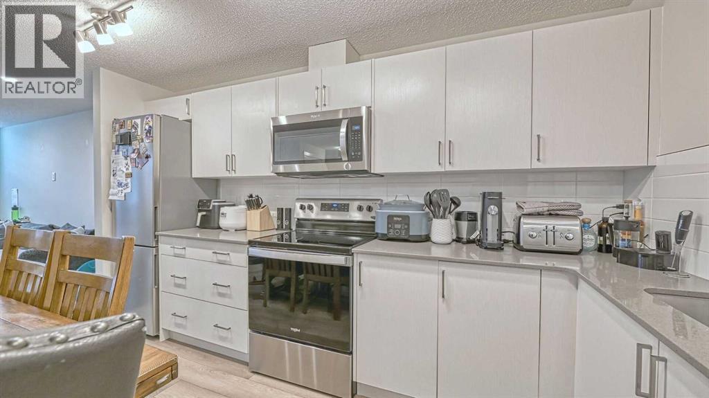417 Cranbrook Square SE, Calgary, Alberta  T3M 3K8 - Photo 5 - A2304512