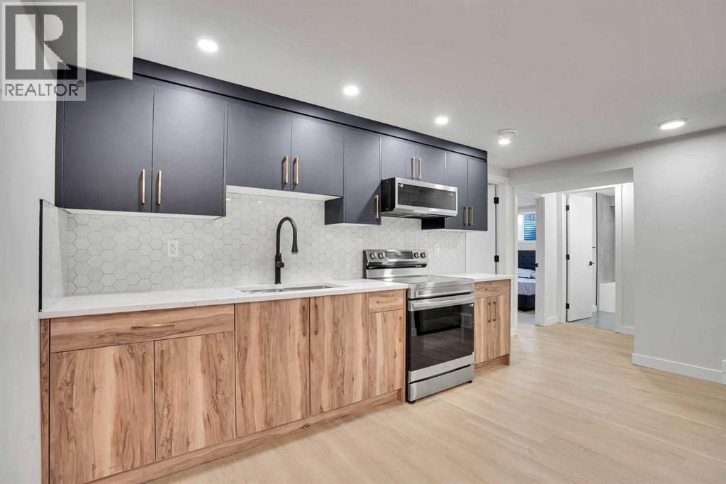 12112 Canfield Road Sw, Calgary, Alberta  T2W 1V2 - Photo 25 - A2300454