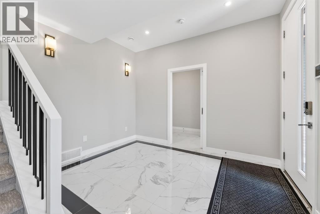 847 77 Street SW, Calgary, Alberta  T3H 6B2 - Photo 5 - A2306382