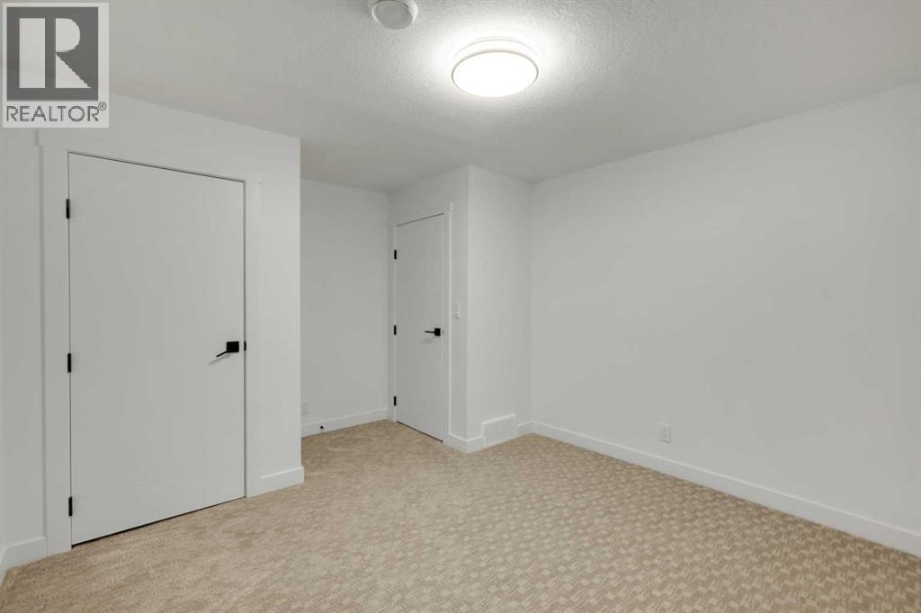 6316 Travois Crescent NW, Calgary, Alberta  T2K 3S7 - Photo 35 - A2292570