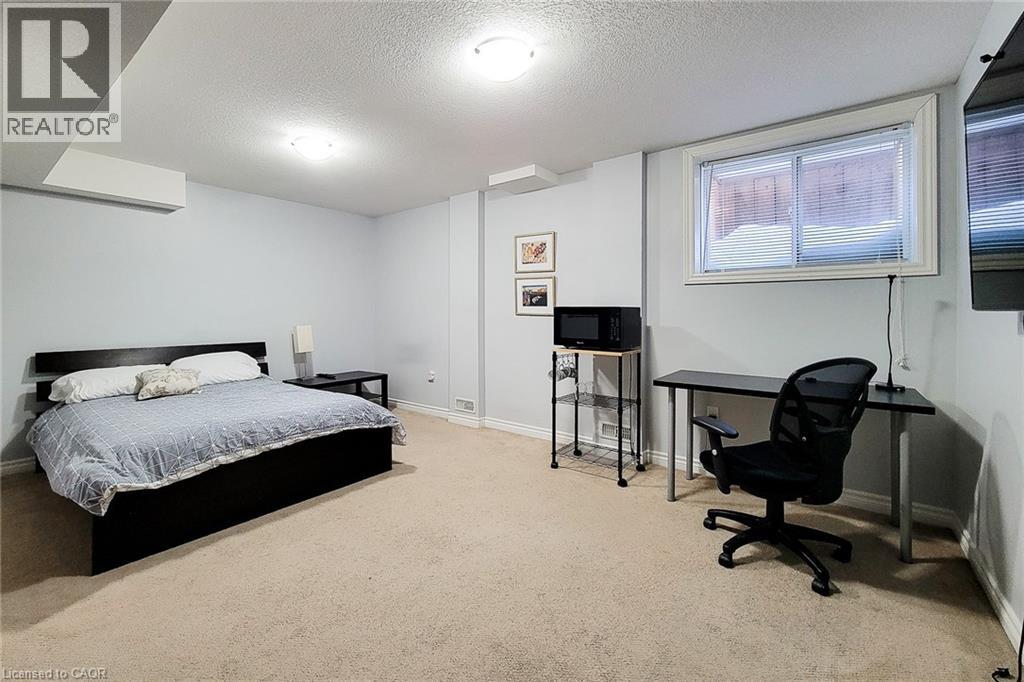 91 Poppy Drive E Unit# 48, Guelph, Ontario  N1L 0M6 - Photo 32 - 40826345