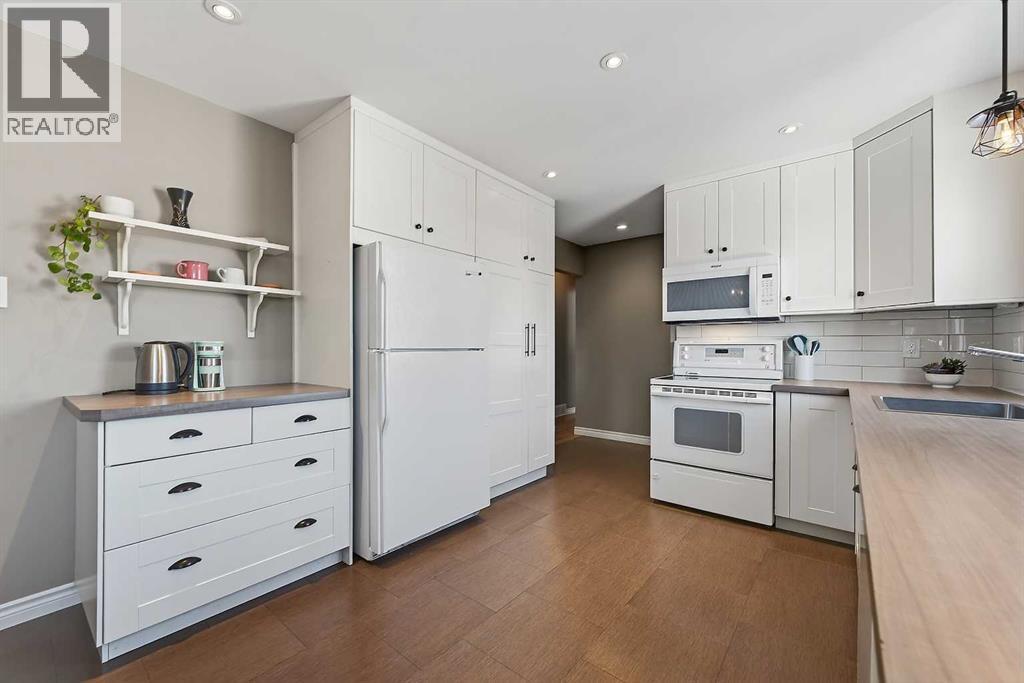 1424 109 Avenue SW, Calgary, Alberta  T2W 0C7 - Photo 10 - A2301663
