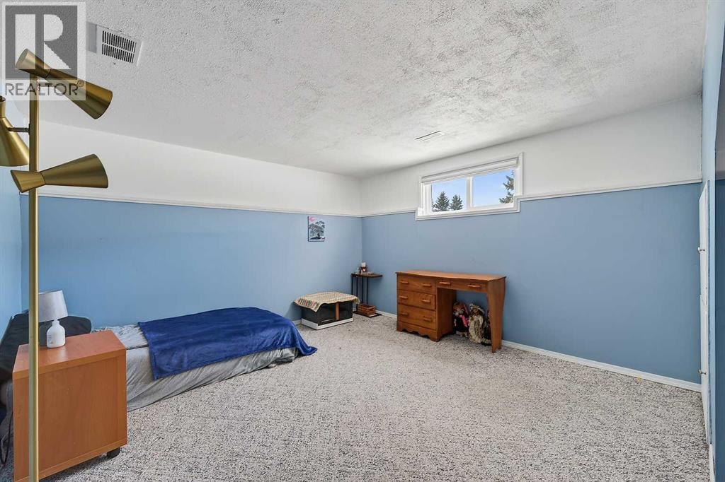 1424 109 Avenue SW, Calgary, Alberta  T2W 0C7 - Photo 26 - A2301663