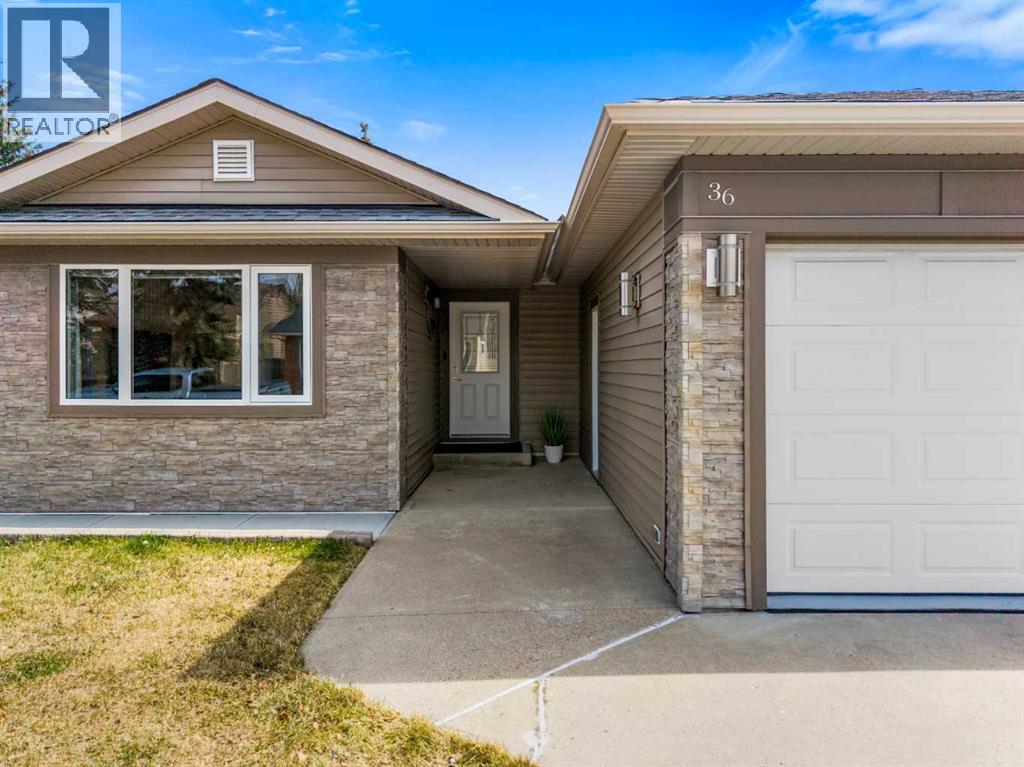 36 Woodfern Rise SW, Calgary, Alberta  T2W 4S2 - Photo 2 - A2305683